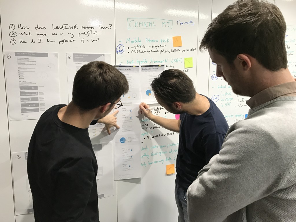 Product and design collaborate on a page design.